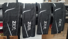 výšivka na pracovné oblečenie, čiapky, zástery,....