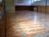 Interiérové športové povrchy - Drevená podlaha s viacvrstvovými parketami