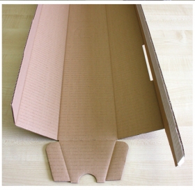  Lichobežníkovo tvarovaný box pre valcové produkty